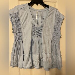 Blue Smocked Flutter Sleeve Blouse by Anthropology.